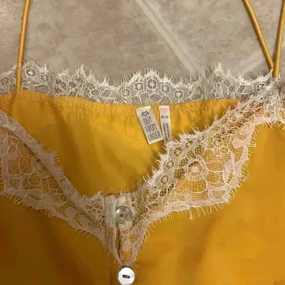 Out from under - Picture 2 of 3